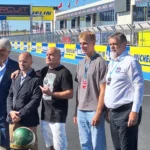 Magyar MotoGP pályán a Balaton Park Circuiten tartottunk megemlékezést Drapál Jánosról amin jelen volt a fia Drapál Ferenc és Talmácsi Gábor is.